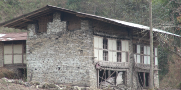 Empty homes, fallow fields in Pasaphu Village